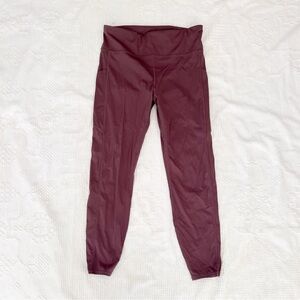 Vuori Stride Leggings in Chestnut Large? Pocket